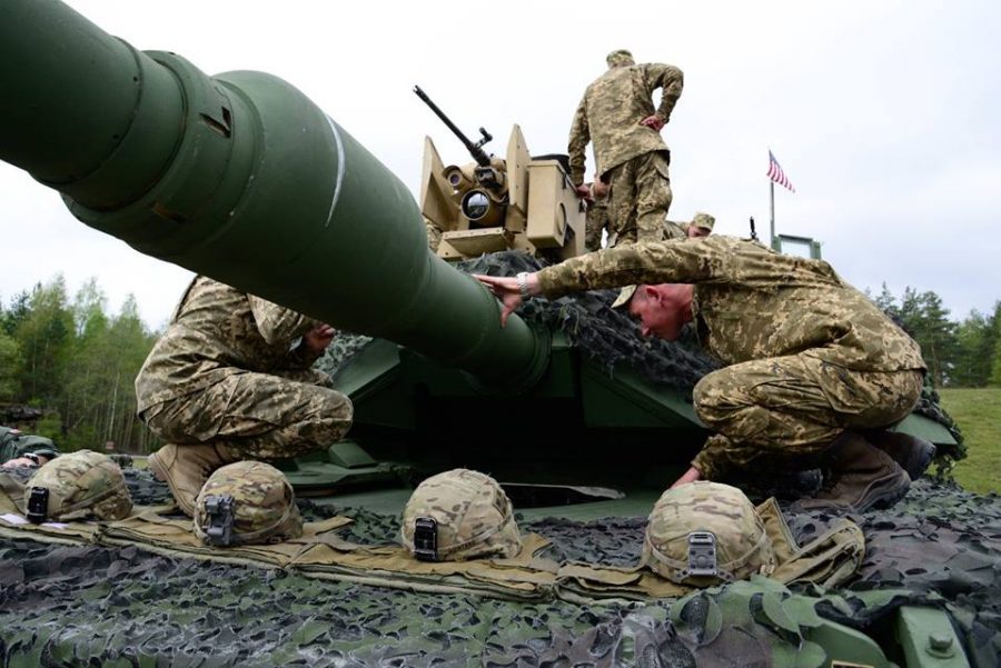 Strong Europe Tank Challenge - Ukrainian soldiers inspect a M1 Abrams Main Battle Tank
